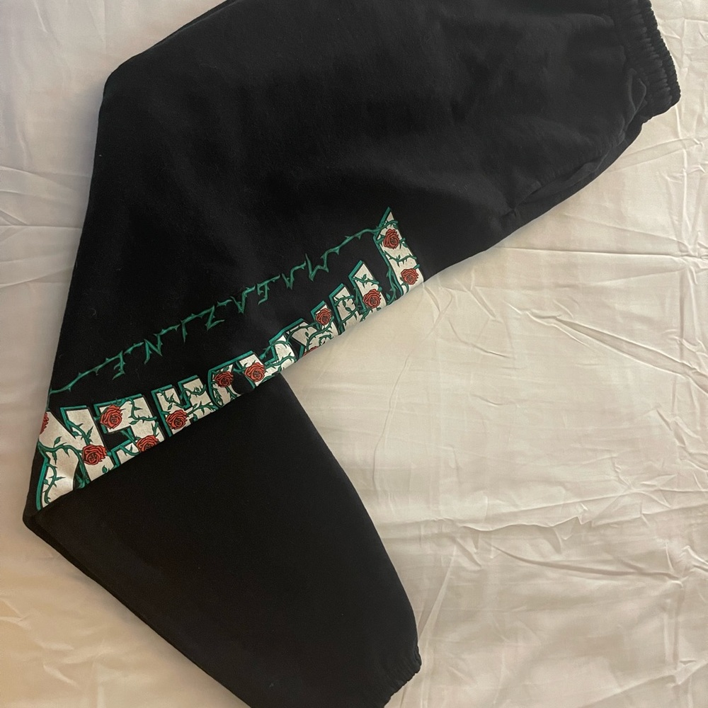 Thrasher black sweatpants, size adult small, unisex.